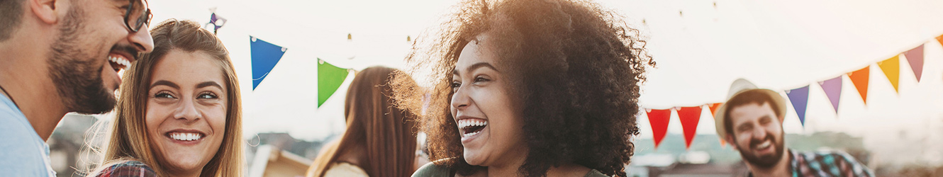 Friends laughing at a party