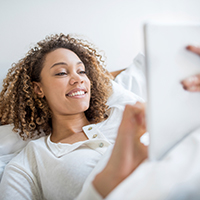 Lady using a smart tablet